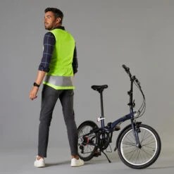 BTWIN GILET VELO SANS MANCHE REVERSIBLE CERTIFIE EPI VISIBILITE JOUR NUIT 560 HOMME -Vélo Équipement Magasin gilet velo sans manche reversible certifie epi visibilite jour nuit 560 homme 1